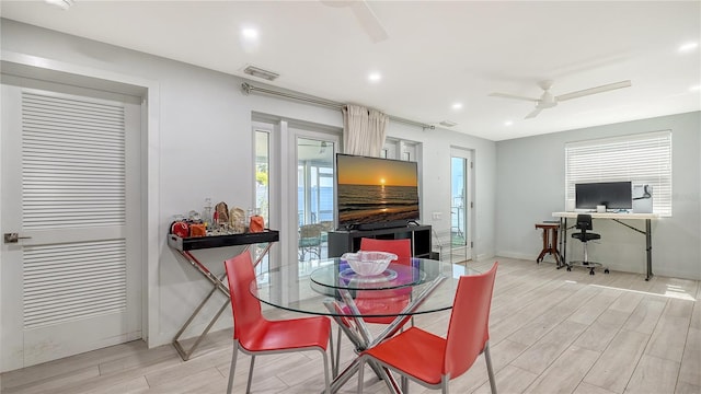 dining room with a ceiling fan, recessed lighting, baseboards, light wood finished floors, and visible vents