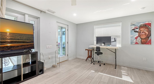office with baseboards, recessed lighting, visible vents, and wood finished floors