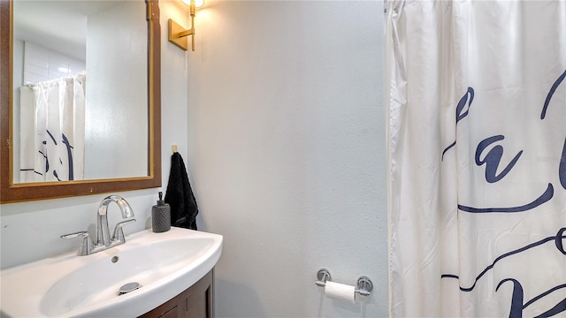 full bath with vanity and a shower with curtain