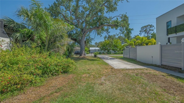 view of yard with fence