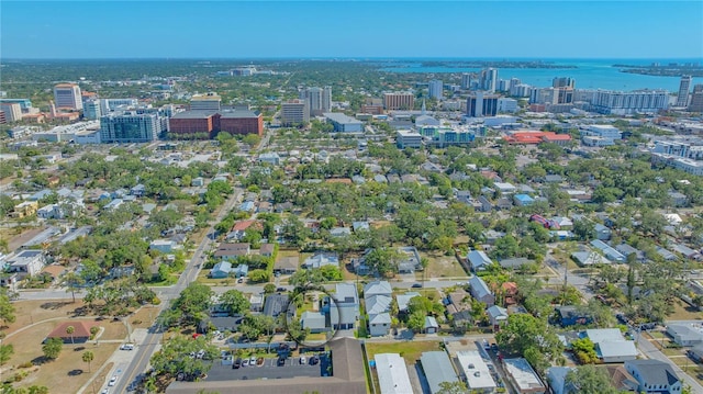 aerial view with a water view and a city view