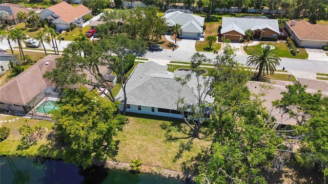 aerial view featuring a residential view and a water view