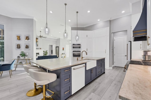 7257 Greystone St, Lakewood Ranch, FL 34202 - kitchen with custom range hood, a sink, ornamental molding, and white appliances