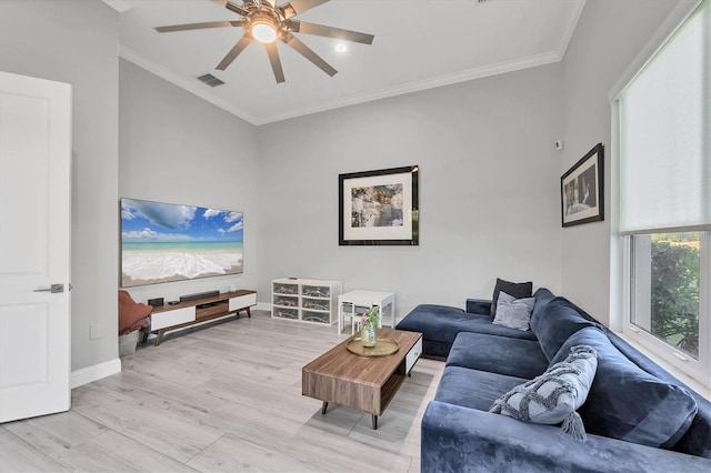 7257 Greystone St, Lakewood Ranch, FL 34202 - living room with crown molding, light wood-style floors, ceiling fan, and visible vents