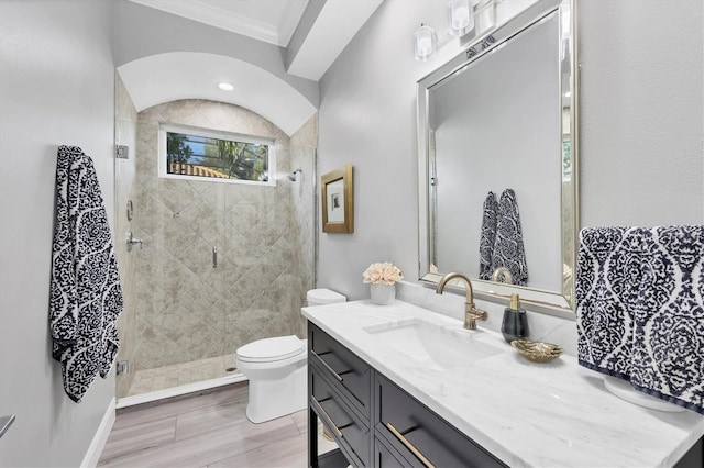 7257 Greystone St, Lakewood Ranch, FL 34202 - full bathroom featuring baseboards, ornamental molding, toilet, vanity, and a stall shower