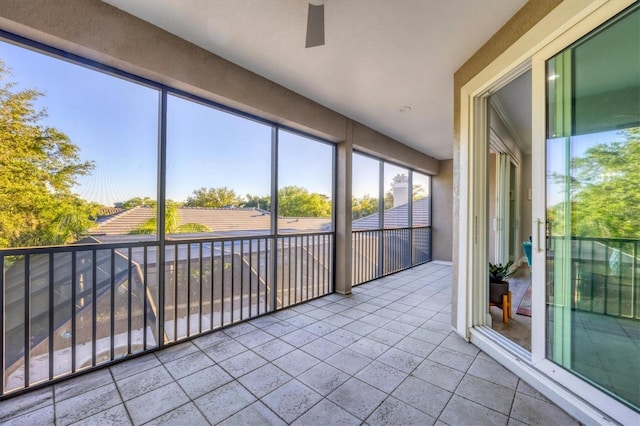 7257 Greystone St, Lakewood Ranch, FL 34202 - unfurnished sunroom with a ceiling fan