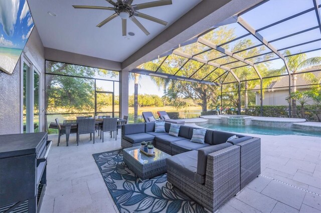 7257 Greystone St, Lakewood Ranch, FL 34202 - view of patio with an outdoor hangout area, a lanai, outdoor dining area, a ceiling fan, and a pool with connected hot tub