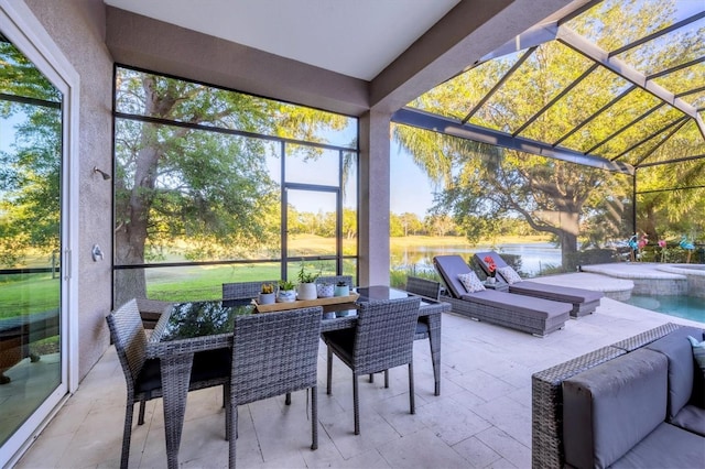 7257 Greystone St, Lakewood Ranch, FL 34202 - sunroom featuring outdoor lounge area, outdoor dining area, and a healthy amount of sunlight