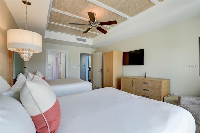 bedroom with visible vents, wood ceiling, ensuite bath, and a ceiling fan