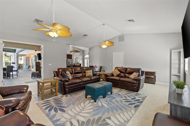 living area with a ceiling fan, visible vents, and light tile patterned floors