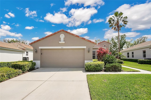 9818 Portside Ter, Bradenton, FL 34212 - mediterranean / spanish house featuring a front yard, concrete driveway, stucco siding, an attached garage, and central AC