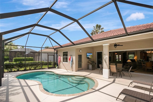 9818 Portside Ter, Bradenton, FL 34212 - pool featuring ceiling fan, a lanai, and a patio area
