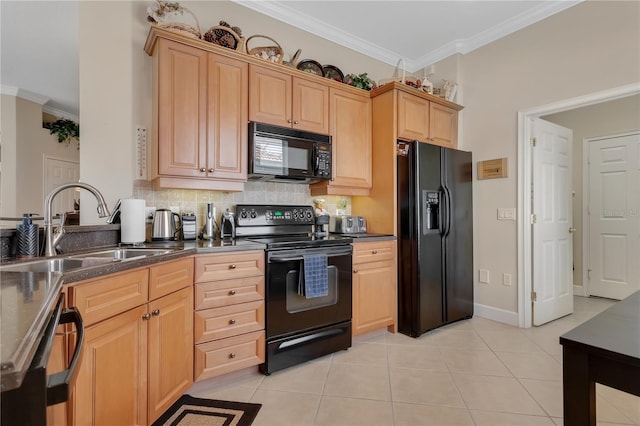 9818 Portside Ter, Bradenton, FL 34212 - kitchen with dark countertops, a sink, ornamental molding, and black appliances