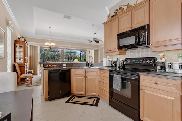 9818 Portside Ter, Bradenton, FL 34212 - kitchen featuring a sink, black appliances, decorative backsplash, and light brown cabinetry