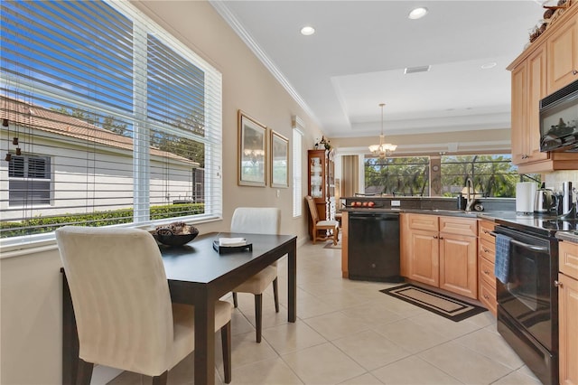 9818 Portside Ter, Bradenton, FL 34212 - kitchen featuring a healthy amount of sunlight, an inviting chandelier, ornamental molding, dark countertops, and black appliances