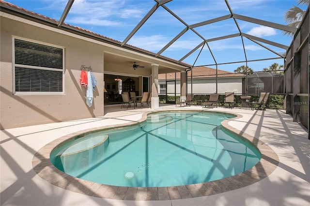 9818 Portside Ter, Bradenton, FL 34212 - pool with glass enclosure, ceiling fan, and a patio area