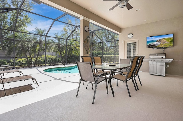9818 Portside Ter, Bradenton, FL 34212 - exterior space featuring a patio area, a ceiling fan, a lanai, grilling area, and outdoor dining area