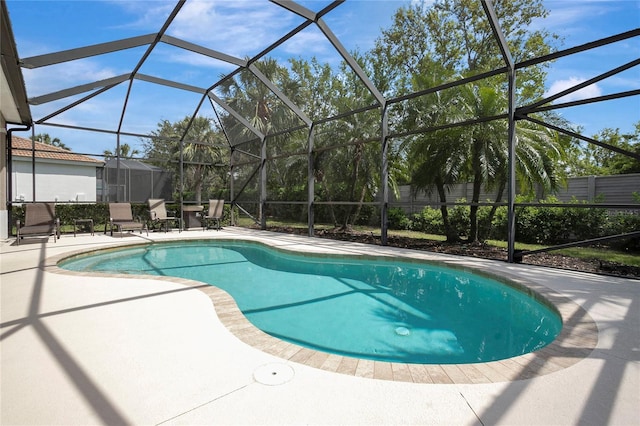 9818 Portside Ter, Bradenton, FL 34212 - pool with a patio, fence, and glass enclosure