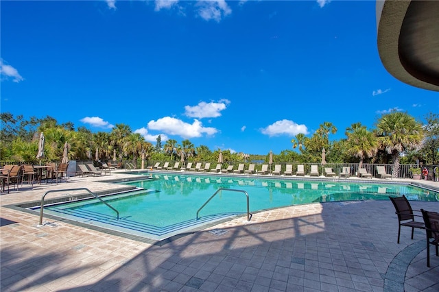 9818 Portside Ter, Bradenton, FL 34212 - community pool with fence and a patio area