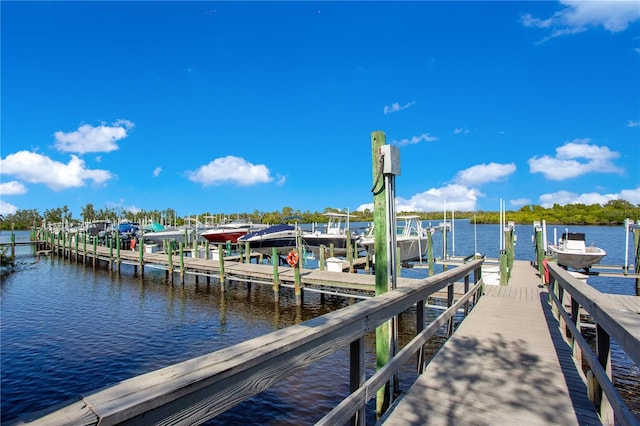 9818 Portside Ter, Bradenton, FL 34212 - view of dock featuring a water view and boat lift