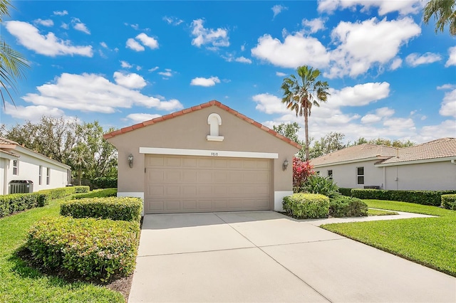 9818 Portside Ter, Bradenton, FL 34212 - mediterranean / spanish home with central AC, concrete driveway, a front lawn, stucco siding, and an outbuilding