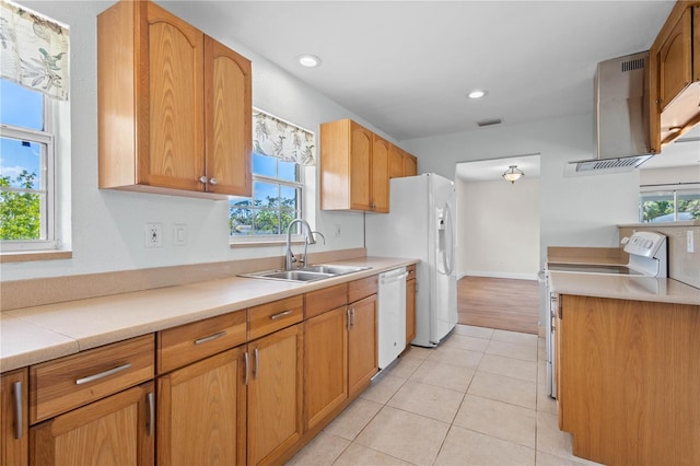 1665 Harmony Dr, Port Charlotte, FL 33952 - kitchen featuring light countertops, a sink, light tile patterned floors, white appliances, and island range hood