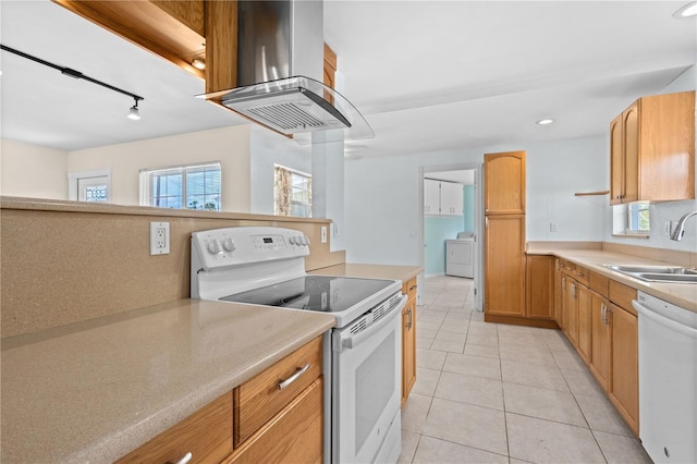 1665 Harmony Dr, Port Charlotte, FL 33952 - kitchen with light tile patterned flooring, light countertops, island exhaust hood, white appliances, and a sink