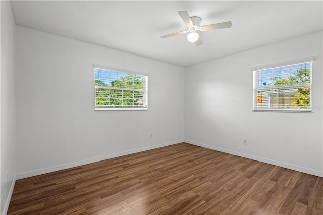 1665 Harmony Dr, Port Charlotte, FL 33952 - empty room featuring baseboards, ceiling fan, and wood finished floors