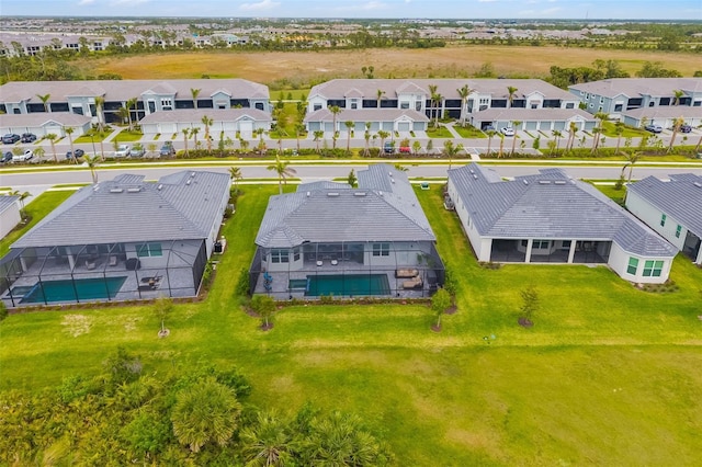12557 Galapagos Ct, Venice, FL 34293 - aerial perspective of suburban area featuring a pool area