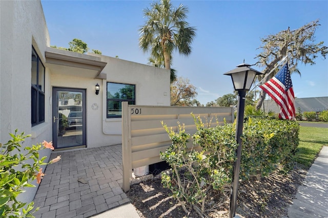 501 Lakeside Dr Unit 501, Bradenton, FL 34210 - entrance to property with stucco siding and fence