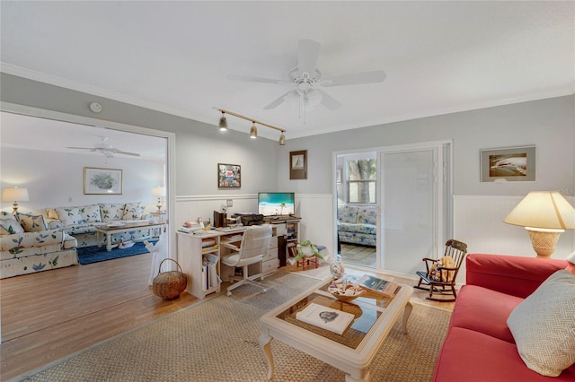501 Lakeside Dr Unit 501, Bradenton, FL 34210 - living area featuring ornamental molding, wood finished floors, a ceiling fan, and wainscoting