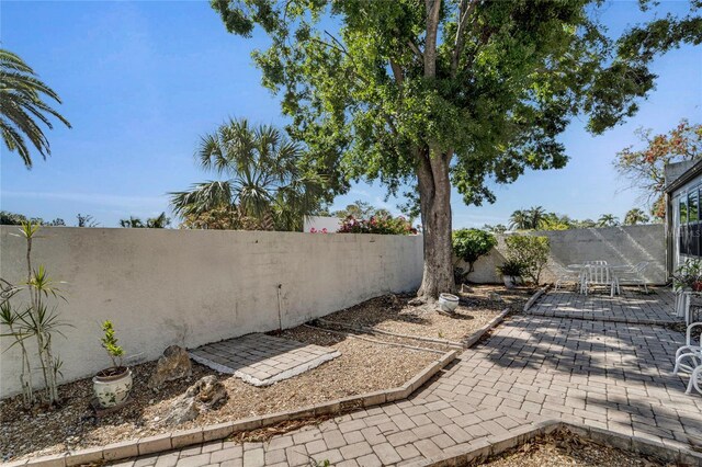 501 Lakeside Dr Unit 501, Bradenton, FL 34210 - view of patio / terrace featuring a fenced backyard