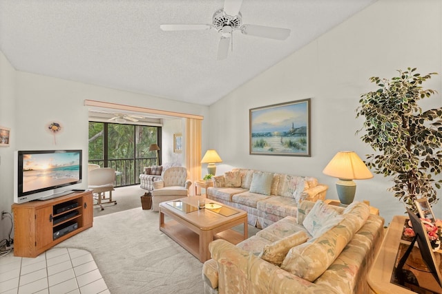 carpeted living room featuring tile patterned flooring, ceiling fan, vaulted ceiling, and a textured ceiling