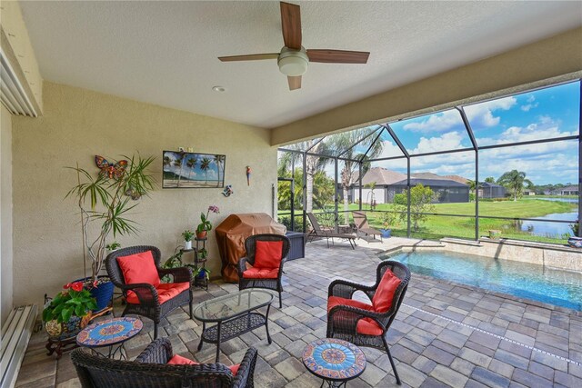 1017 Siberian Gln, Bradenton, FL 34212 - view of patio / terrace featuring an outdoor living space, baseboard heating, a lanai, a ceiling fan, and an outdoor pool