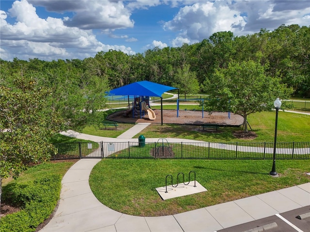 1017 Siberian Gln, Bradenton, FL 34212 - view of home's community with fence, playground community, and a yard