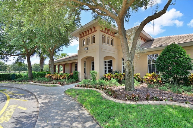 1017 Siberian Gln, Bradenton, FL 34212 - view of front of home featuring stucco siding and a tiled roof