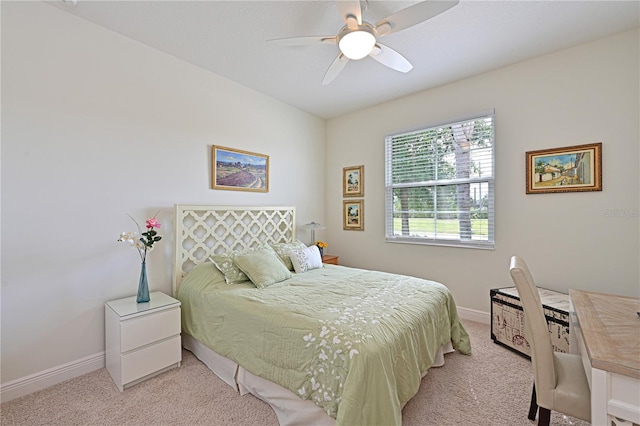 1017 Siberian Gln, Bradenton, FL 34212 - bedroom with light colored carpet, a ceiling fan, and baseboards