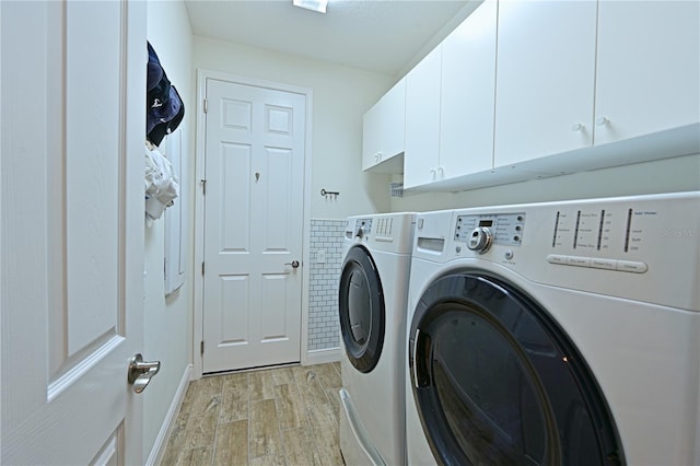1017 Siberian Gln, Bradenton, FL 34212 - washroom featuring light wood-type flooring, cabinet space, and washer and clothes dryer