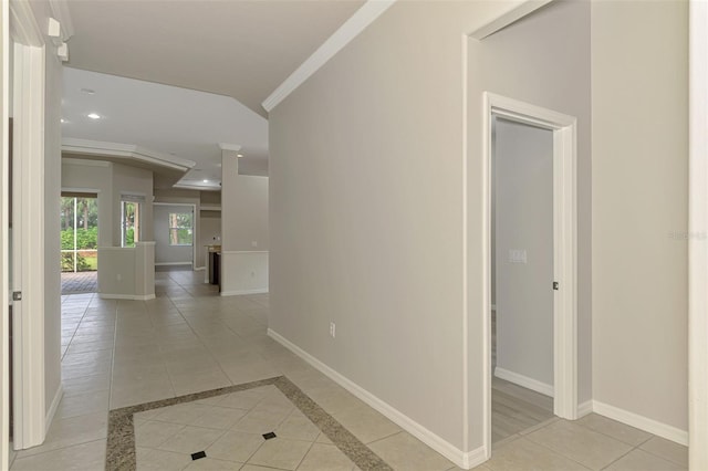6310 Golden Eye Gln, Lakewood Ranch, FL 34202 - corridor with baseboards, crown molding, recessed lighting, and light tile patterned flooring