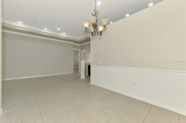 6310 Golden Eye Gln, Lakewood Ranch, FL 34202 - unfurnished room featuring crown molding, a wainscoted wall, a chandelier, light tile patterned flooring, and recessed lighting