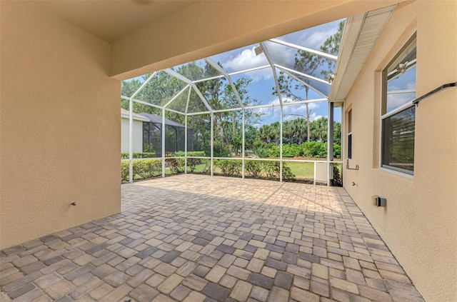 6310 Golden Eye Gln, Lakewood Ranch, FL 34202 - view of patio with glass enclosure and view of scattered trees