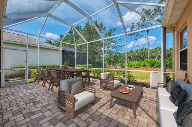 6310 Golden Eye Gln, Lakewood Ranch, FL 34202 - view of patio / terrace featuring an outdoor hangout area, a lanai, and outdoor dining space