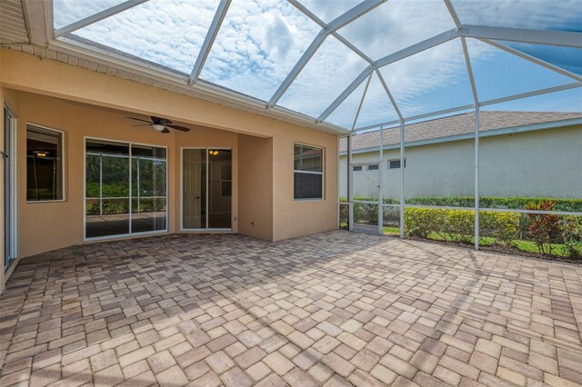 6310 Golden Eye Gln, Lakewood Ranch, FL 34202 - view of patio featuring a ceiling fan and a lanai