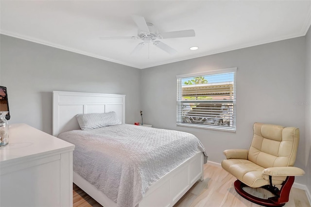 4420 Tecumseh Trl Unit 38, Sarasota, FL 34233 - bedroom with light wood-style floors, ornamental molding, a ceiling fan, baseboards, and recessed lighting