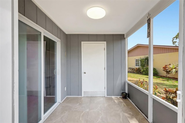 4420 Tecumseh Trl Unit 38, Sarasota, FL 34233 - unfurnished sunroom with plenty of natural light