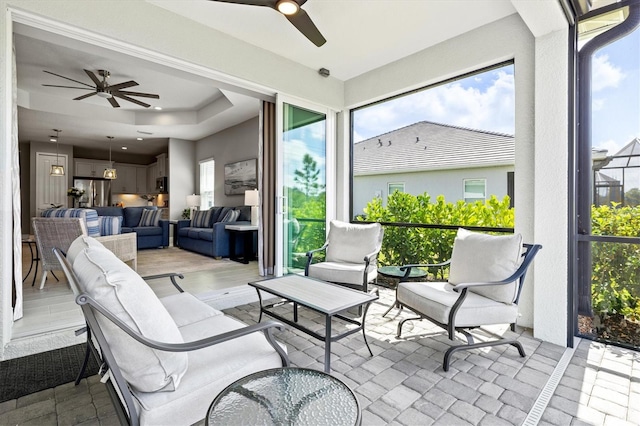 2894 Butterfly Jasmine Trl, Sarasota, FL 34240 - sunroom / solarium with a ceiling fan and an outdoor hangout area