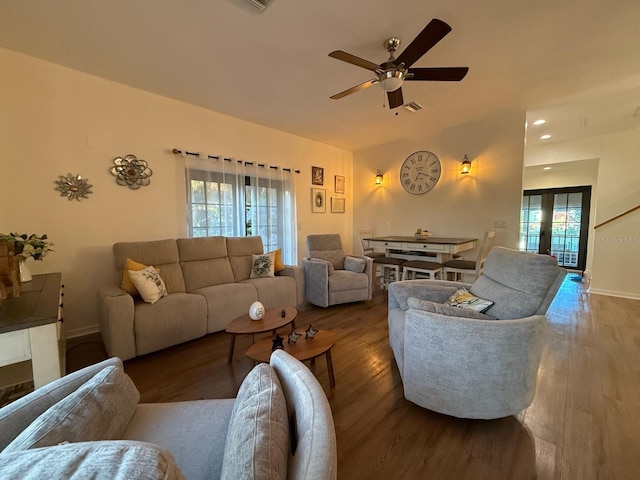 33 Tee View Pl, Rotonda West, FL 33947 - living area featuring wood finished floors, ceiling fan, baseboards, recessed lighting, and french doors