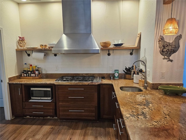 33 Tee View Pl, Rotonda West, FL 33947 - kitchen with wall chimney range hood, stainless steel appliances, a sink, open shelves, and dark wood-style flooring