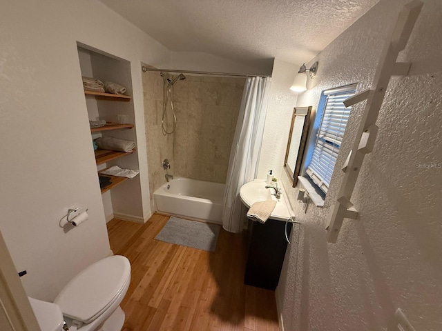 33 Tee View Pl, Rotonda West, FL 33947 - bathroom with a textured wall, vanity, shower / bath combo with shower curtain, wood finished floors, and toilet