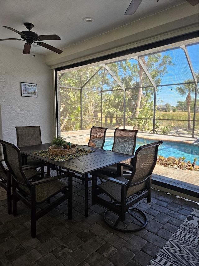33 Tee View Pl, Rotonda West, FL 33947 - view of patio / terrace with ceiling fan, outdoor dining space, and an outdoor pool